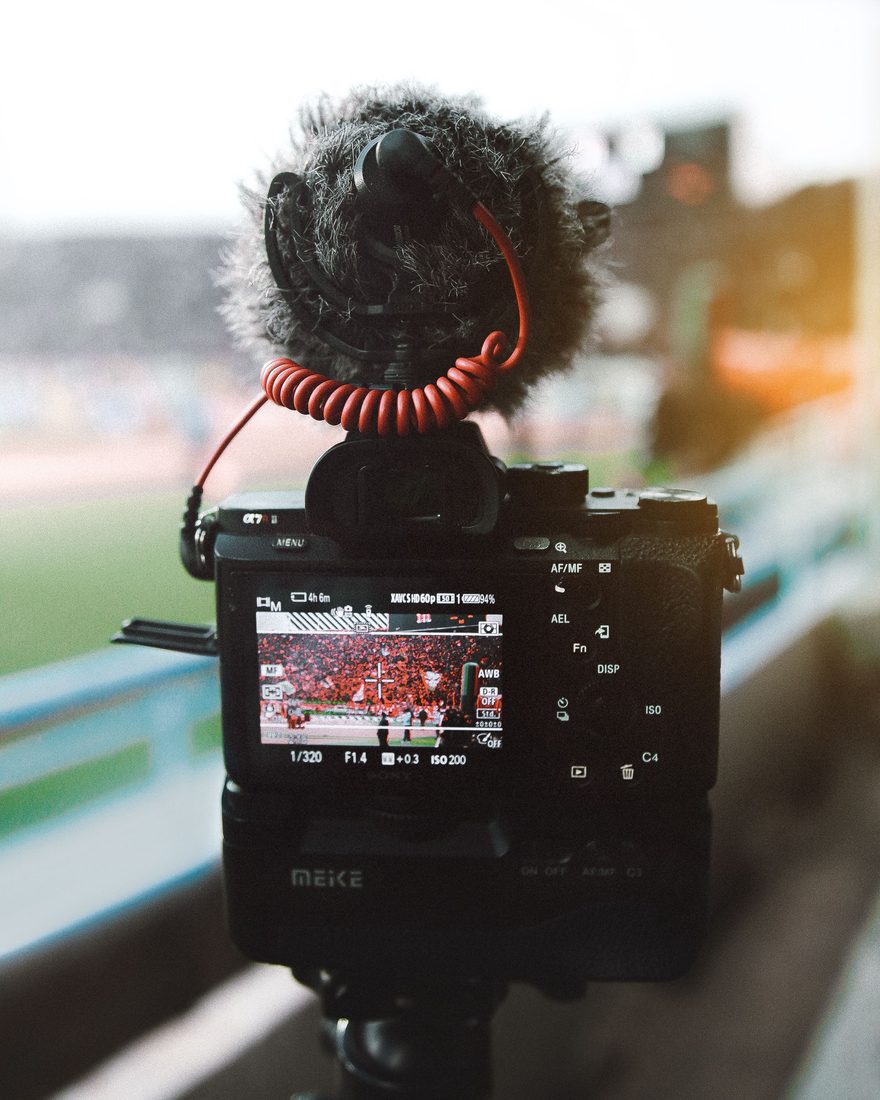 A mirrorless camera set up to stream an event
