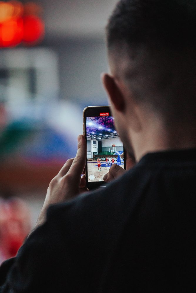 Filming from the stands on a phone